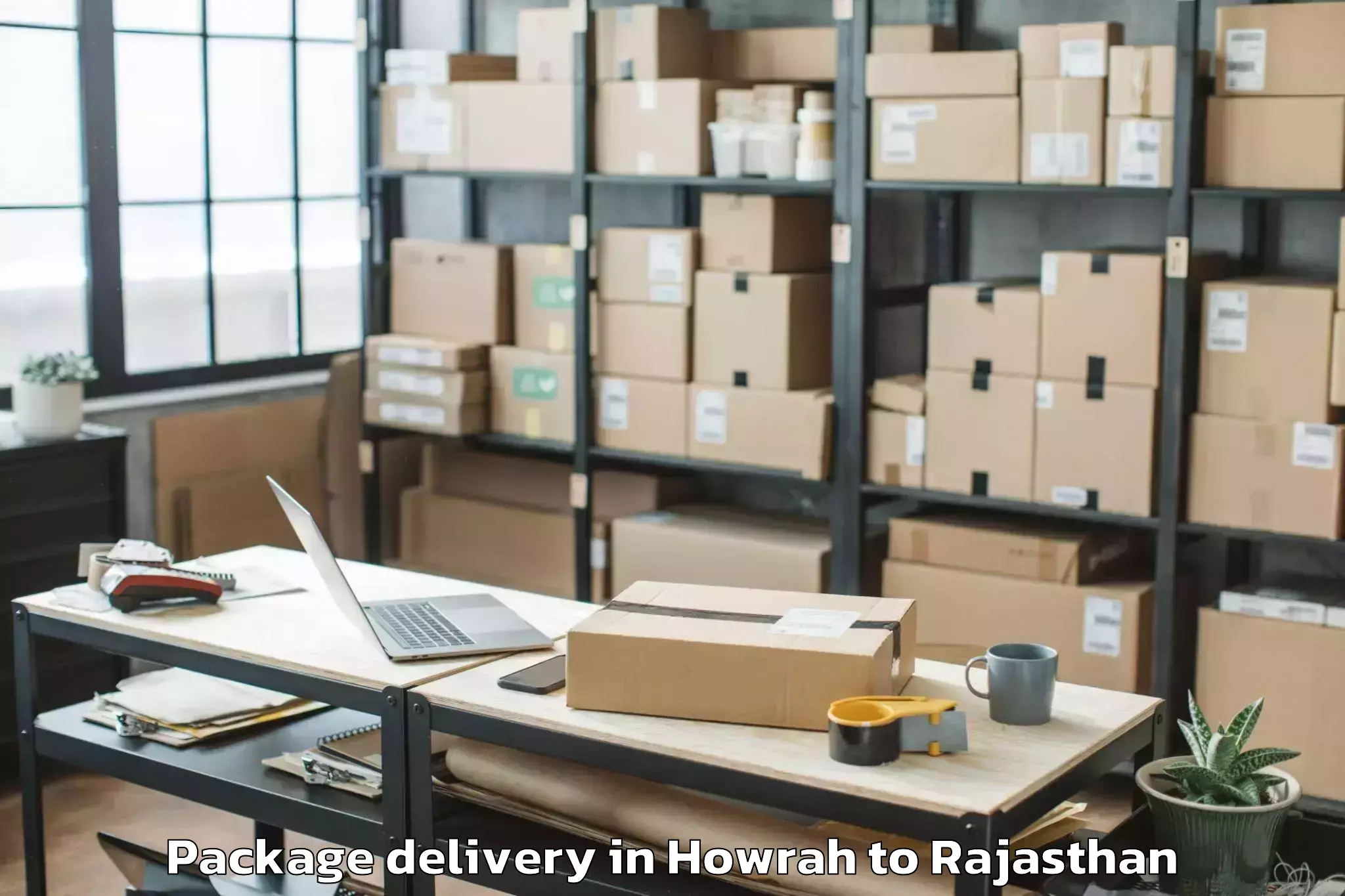 Howrah to Haridev Joshi University Of Jo Package Delivery Booking